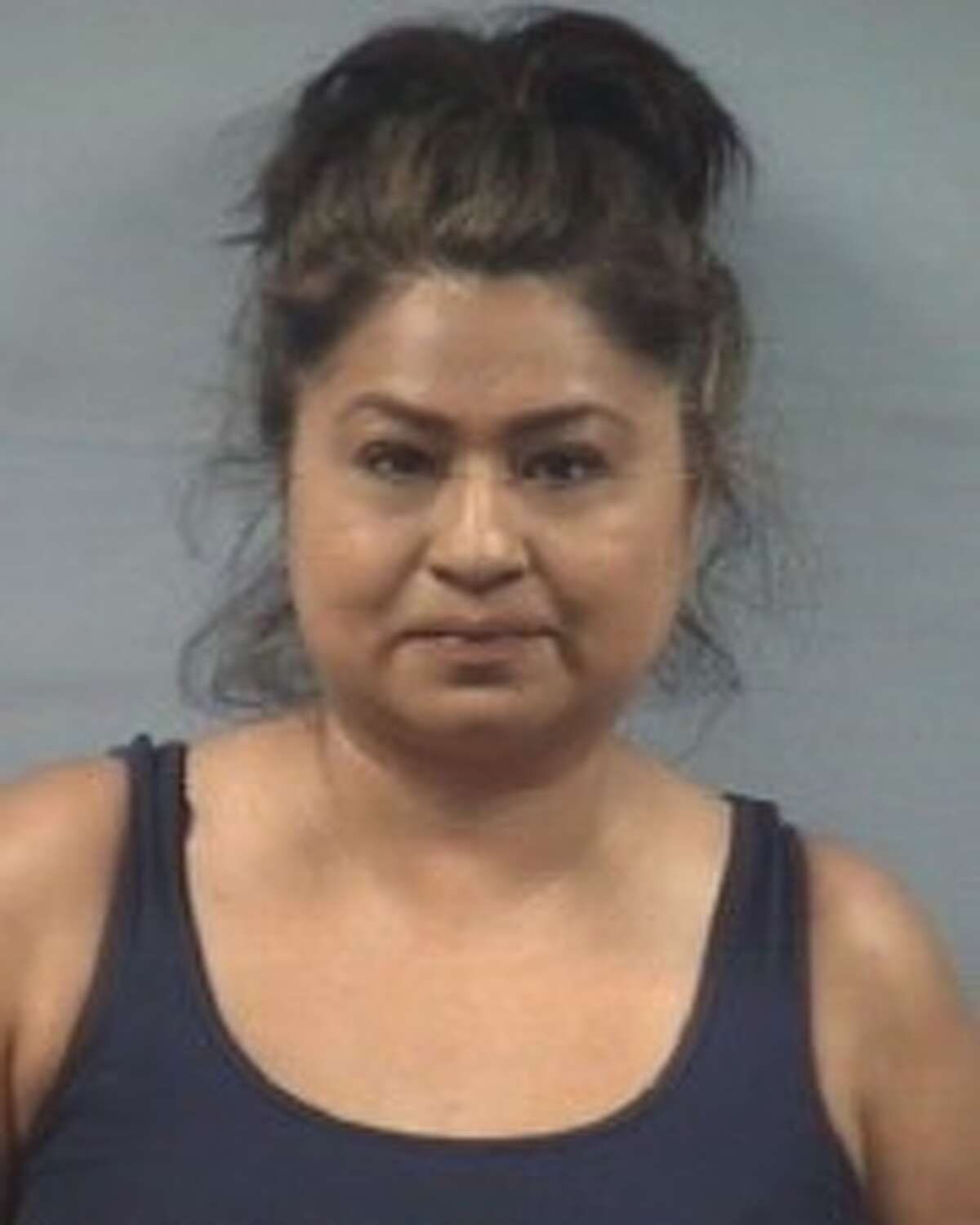 Priscilla Ann Vasquez, 44, was arrested and charged with assault by contact and criminal mischief.