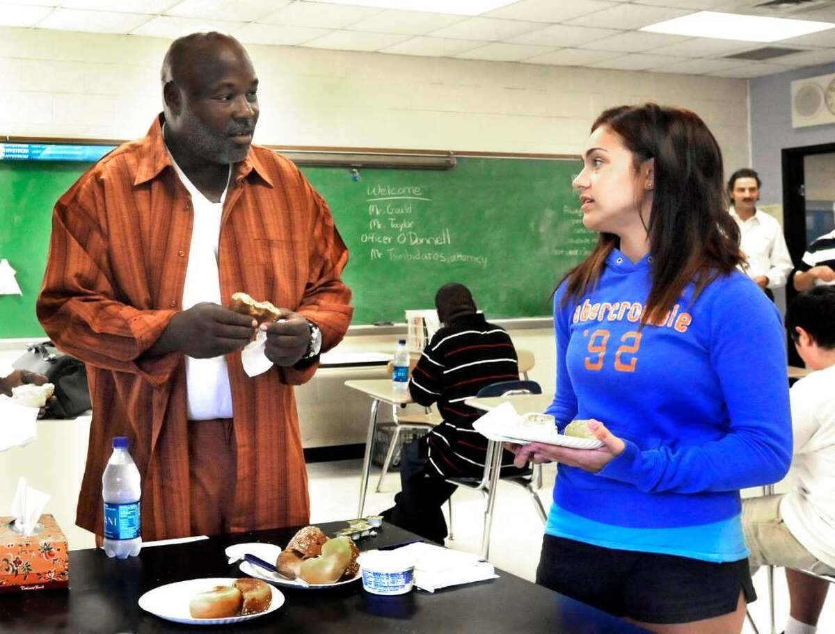 George Gould, whose 1993 murder conviction was overturned in March, talks with Michelle Klein, 16, a Bethel High student, during a summer school program at Bethel Middle School, Wednesday, July 28, 2010.