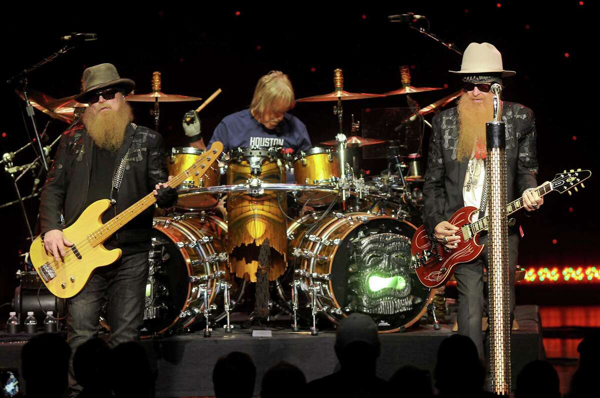 From left: Dusty Hill, Frank Beard and Billy Gibbons of ZZ Top perform during their Tonnage Tour at the Smart Financial Centre in Sugarland Sunday Sept. 10, 2017.(Dave Rossman Photo)