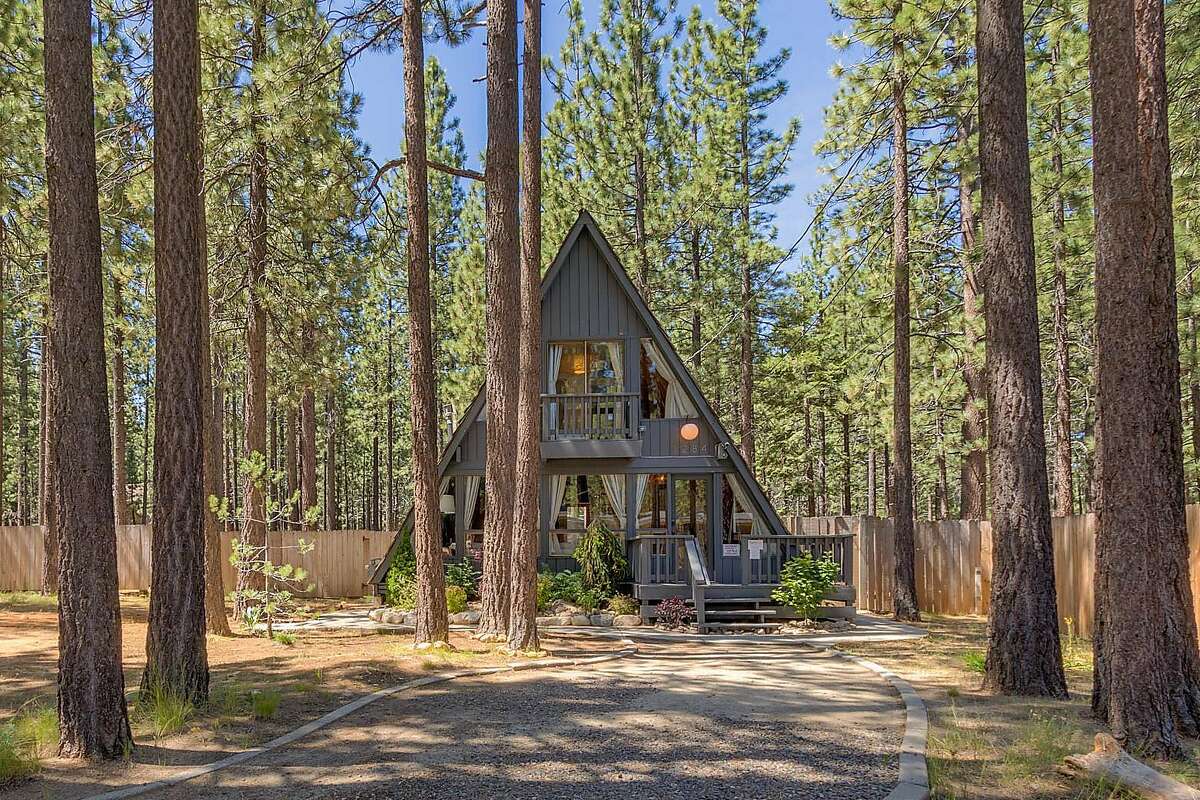 A quick drive from Heavenly Village in South Lake Tahoe, this A-frame home sleeps six and includes a large outdoor hot tub and gas grill.