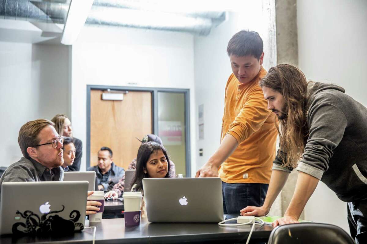 Students work at a University of California, Los Angeles boot camp hosted in partnership with Trilogy Education. Trilogy is launching a computer-coding boot camp at the University of Connecticut-Stamford campus.