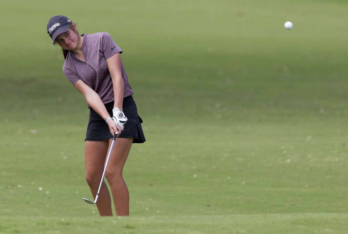 Brandee Fleming of Magnolia chips onto the 17 green during the final round of the Class 5A UIL State Golf Championships at White Wing Golf Club, May, 11, 2019, in Georgetown.