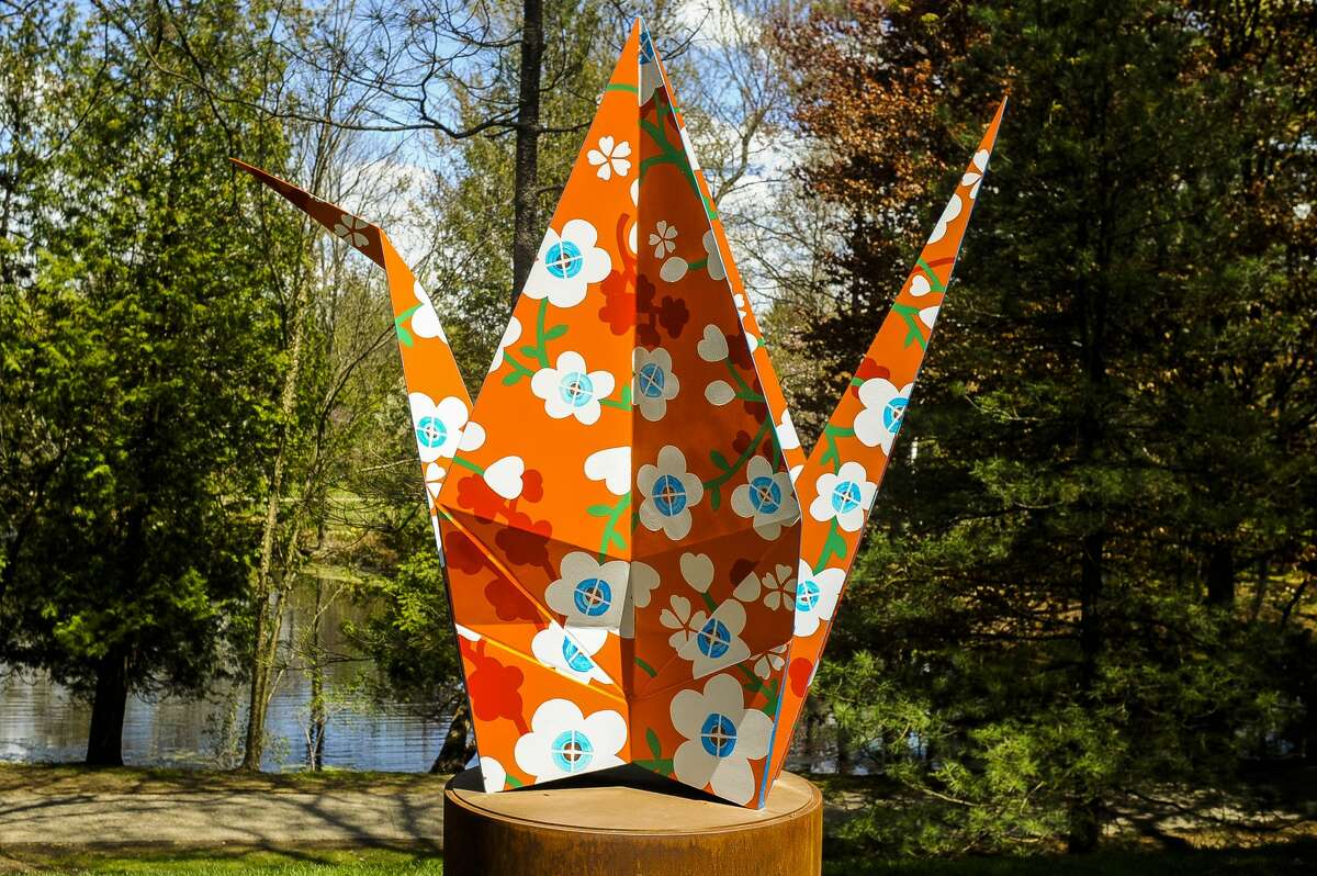 Metal sculptures are displayed at various spots within Dow Gardens on Tuesday, May 14, 2019. The exhibition, entitled Origami in the Garden, was created by Santa Fe artists Jennifer and Kevin Box. (Victoria Ritter/vritter@mdn.net)