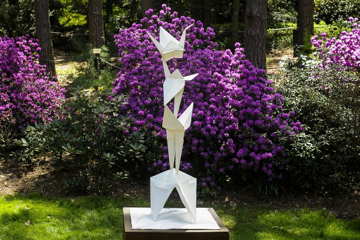 Metal sculptures are displayed at various spots within Dow Gardens on Tuesday, May 14, 2019. The exhibition, entitled Origami in the Garden, was created by Santa Fe artists Jennifer and Kevin Box. (Victoria Ritter/vritter@mdn.net)