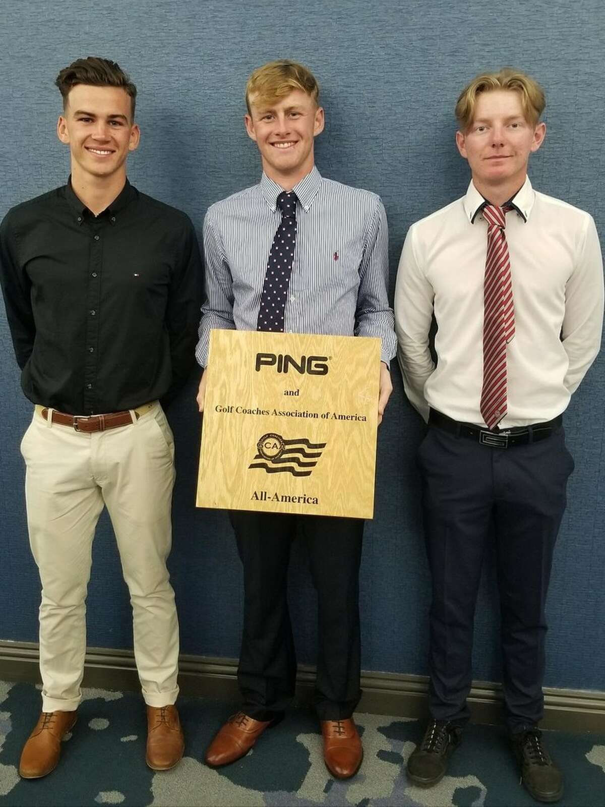 Midland College golfers, from left to right, Max Charles, Callum Bruce and George Saunders pose after Monday night's NJCAA National Golf Tournament banquet in Melbourne, Fla. Bruce was named PING First-Team NJCAA All-American, while Charles and Saunders were named Freshmen All-Americans.