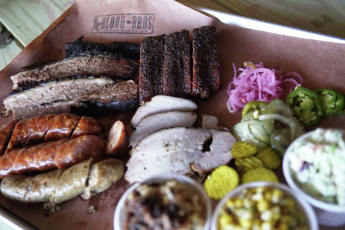 A selection of sausages, brisket, ribs, and turkey are shown at Blood Bros. BBQ, 5425 Bellaire Blvd., Bellaire.