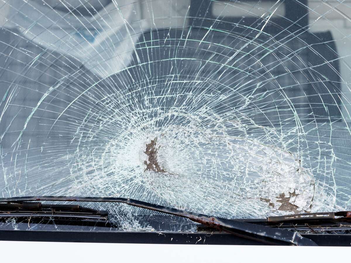 A car's broken windshield is shown in this file photo. 
