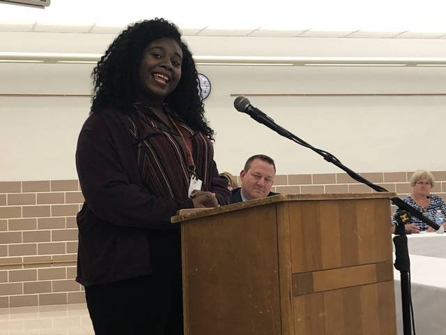 PHOTOS | Ballard recites poem at D7 meeting following national win