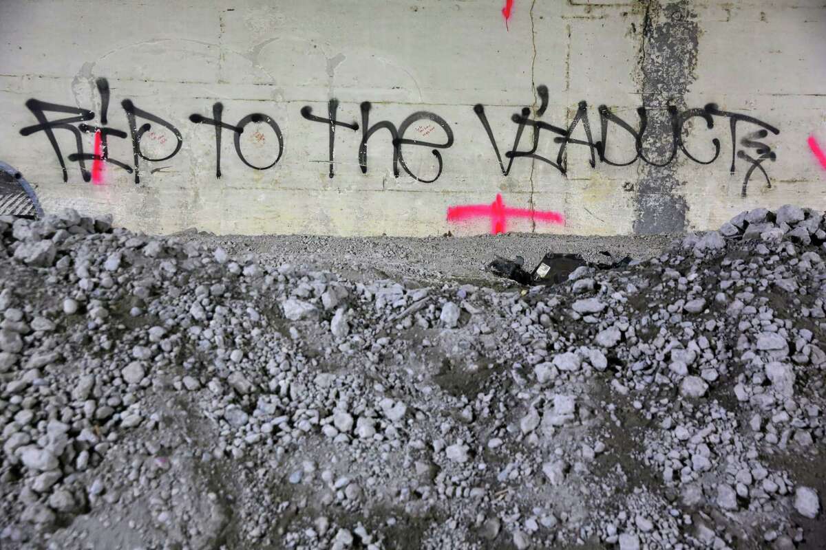 Messages are left visible on the walls of the 2,100-foot-long Battery Street Tunnel, Wednesday as contractor Kiewit begins filling it with rubble from the demolition of the Alaskan Way Viaduct. The tunnel will eventually be filled with 74,000 tons of recycled rubble. Photograph taken May 15, 2019.