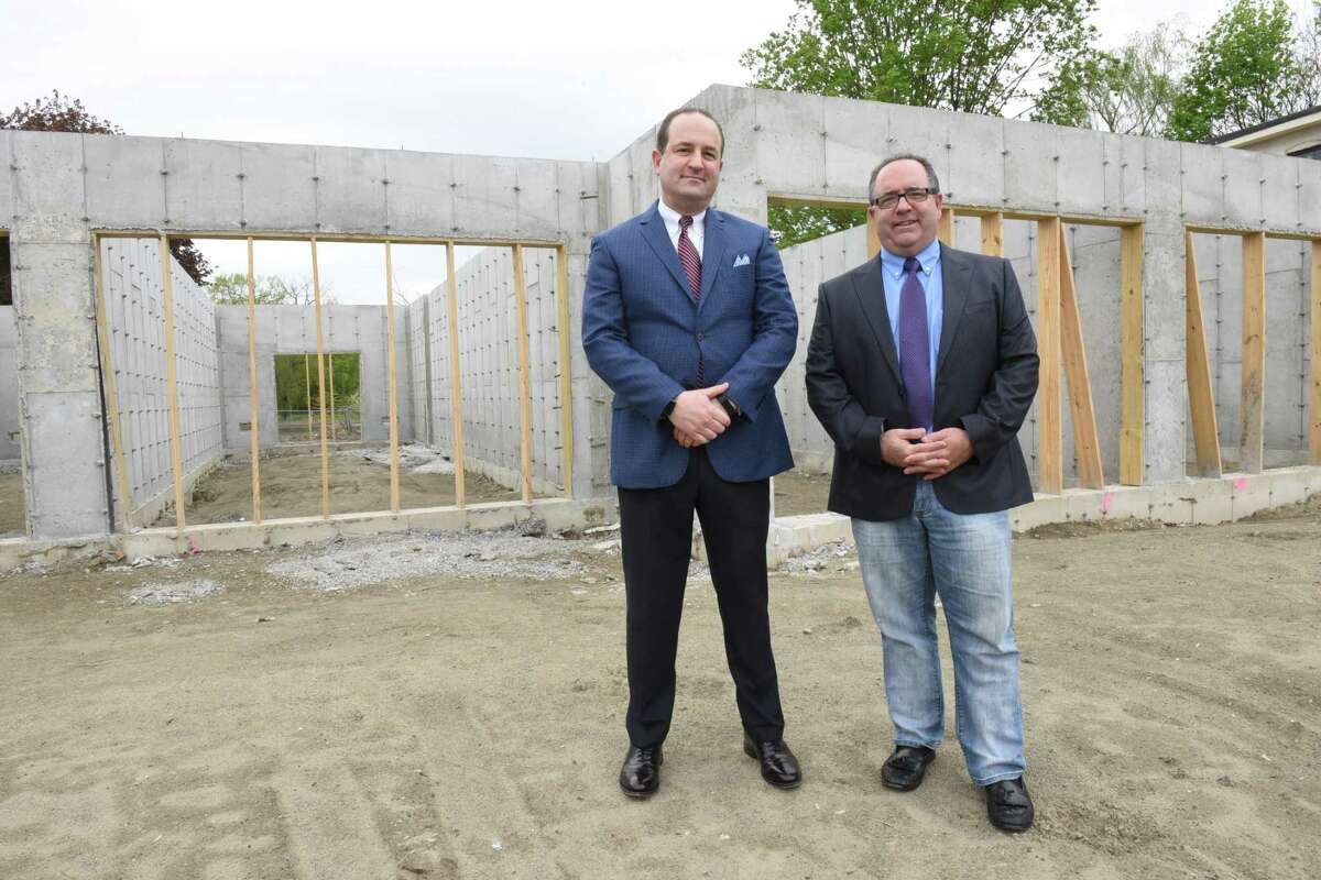 Construction of one of the waterfront properties of real estate investor/developers Tino Demarco, right, and his partner Steve Manzelli, left, are building to be more flood compliant on Thursday, May 9, 2019 in Waterford, N.Y. (Lori Van Buren/Times Union)