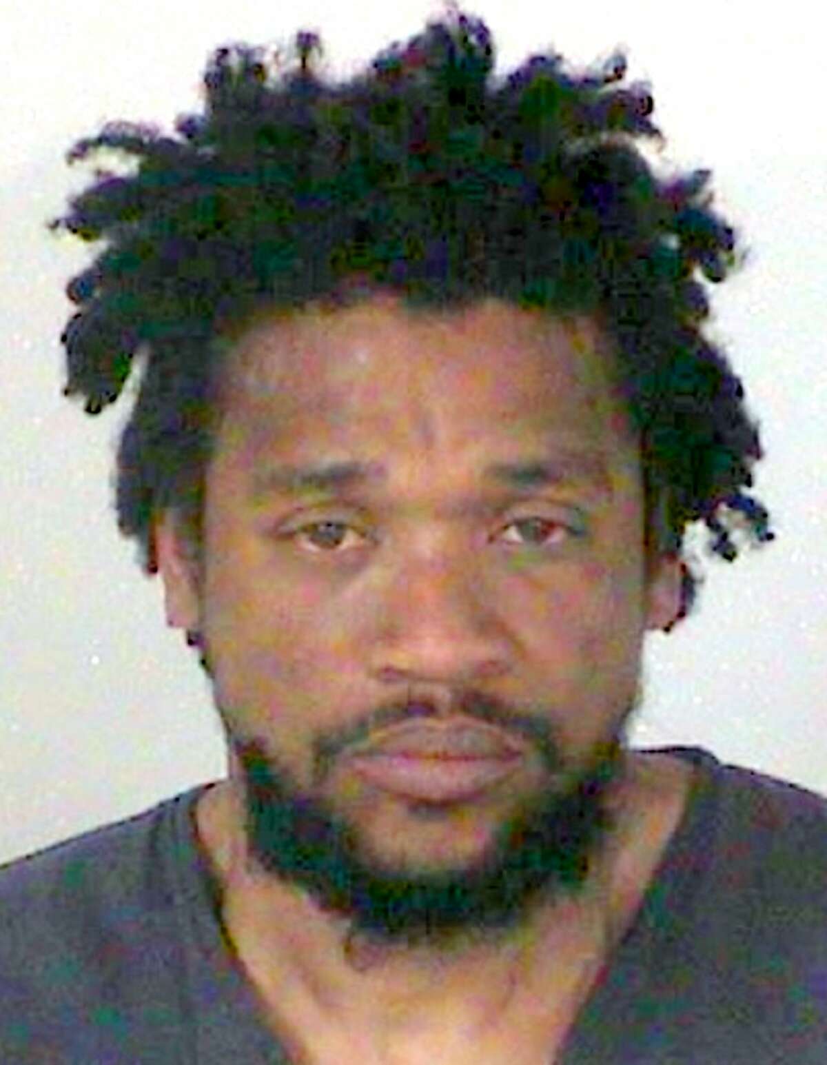 This undated booking photo from the Douglas County, Nev., Sheriff's Office shows Stefon Jefferson. Authorities have identified a man slain in Berkeley and confirmed their primary suspect is Jefferson, the same man accused of killing relatives in the San Francisco Bay Area before wounding an officer in Nevada, where he was arrested. The San Francisco Chronicle reports University of California Berkeley police officials said Monday, April 29, 2019 the man shot on Friday afternoon in Berkeley's People's Park was 43-year-old Calvin Kelley. Jefferson was charged Monday by prosecutors in Nevada's Douglas County with attempted murder of a police officer. (Douglas County Sheriff's Office via AP)