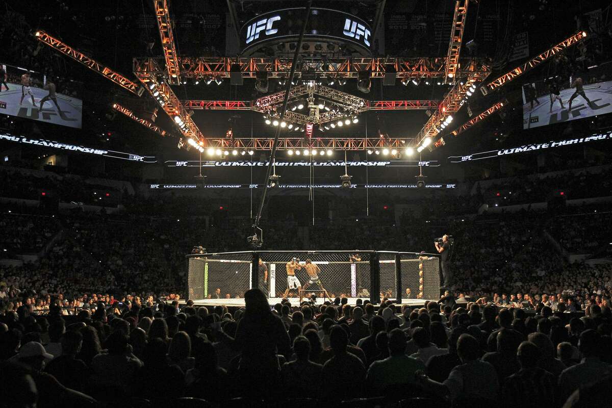 Fans watch during the UFC Fight Night at the AT&T Center on June 28, 2014.