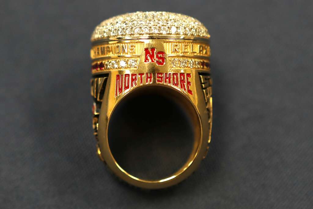 <p>North Shore head coach Jon Kay's state championship ring is shown before a ring ceremony for the players Thursday, May 16, 2019, in Houston. Last fall North Shore captured its third state championship in a</p>