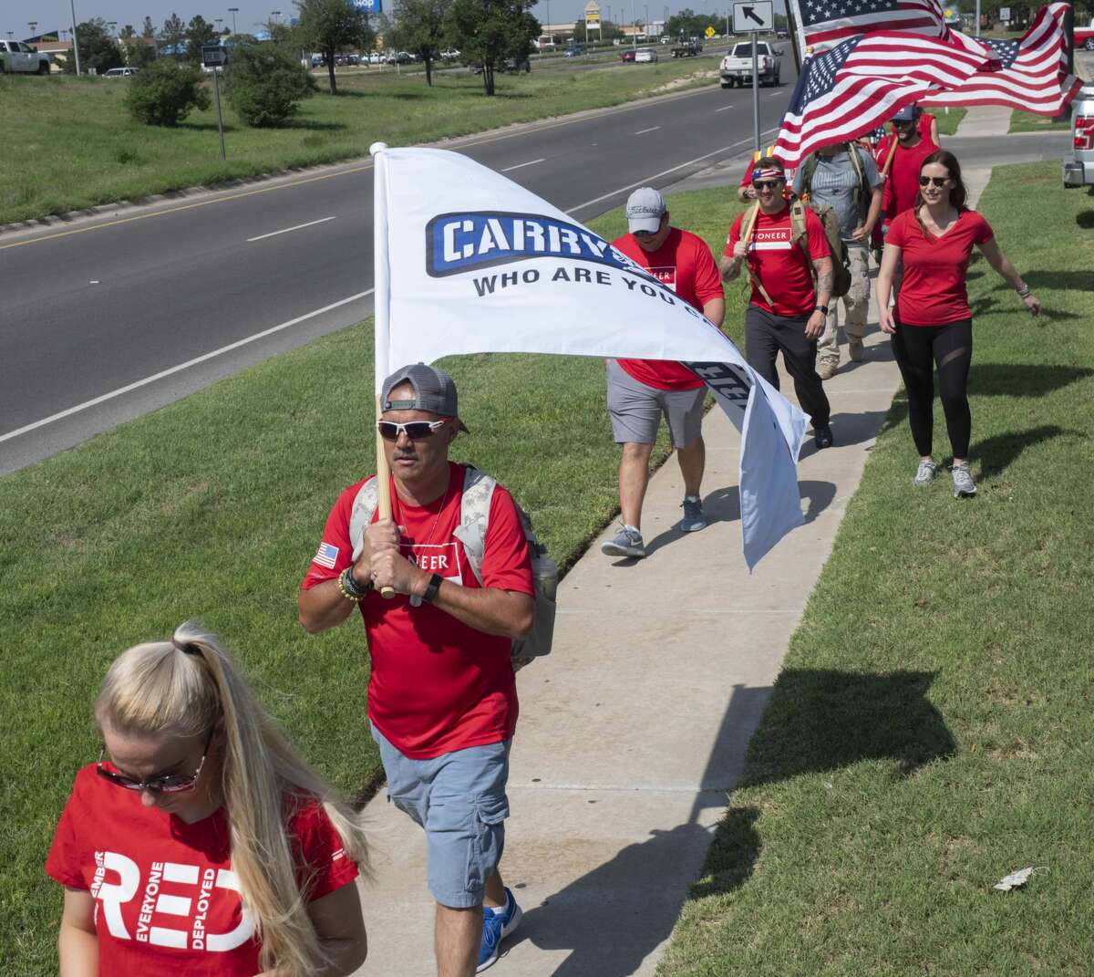 Team members from Carry the Load West Coast Team were joined in Midland by Pioneer employees 05/17/19 to help walk and raise awareness and funds honoring and celebrating military and first responders. Tim Fischer/Reporter-Telegram