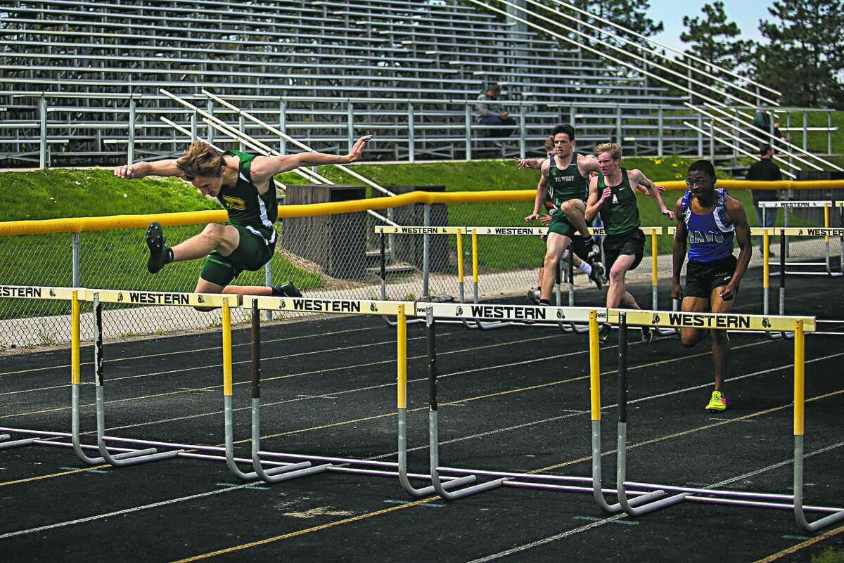 Dow's Garrett Daniels competes in the Mens 110 meter hurdles event at the Division 1 track and field regional held at Bay City Western High School in Bay City on Friday, May 17, 2019. (Josie Norris/for the Daily News)