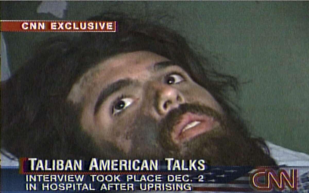 In this image from television broadcast Wednesday, Dec. 19, 2001, American Taliban fighter John Walker Lindh is seen during an interview soon after his capture. According to CNN, the interview took place Dec. 2, 2001. (AP Photos/CNN)