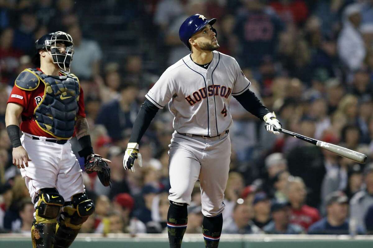 George Springer admires his handiwork after launching a go-ahead, two-run homer in the eighth inning at Fenway Park.