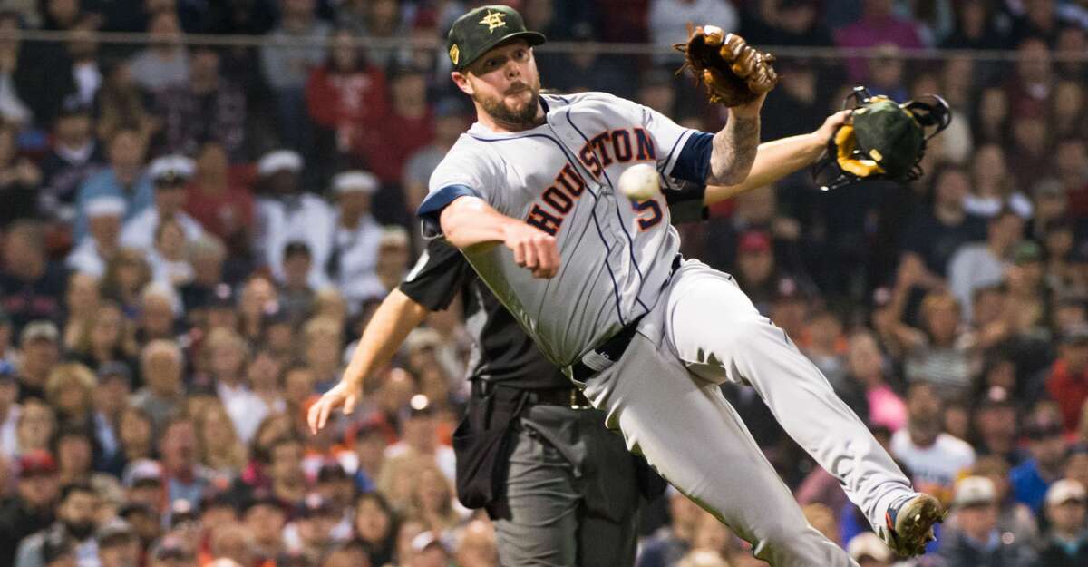 BOSTON, MA - MAY 17: Ryan Pressly #55 of the Houston Astros makes a throw to first base in the eighth inning against the Boston Red Sox at Fenway Park on May 17, 2019 in Boston, Massachusetts. (Photo by Kathryn Riley/Getty Images)