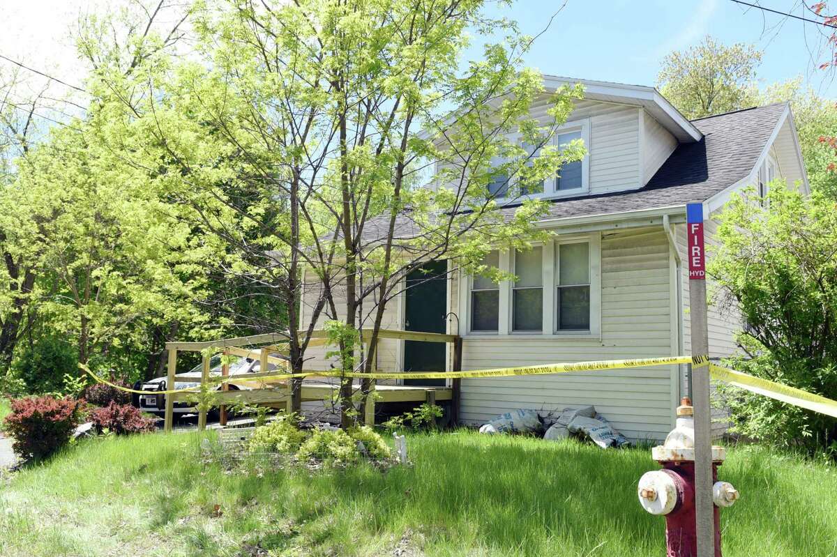 A Guilderland police car sits outside of the home where two people were found dead Friday on Saturday, May 18, 2019 off of Schoolhouse Road in Guilderland, NY. (Phoebe Sheehan/Times Union)