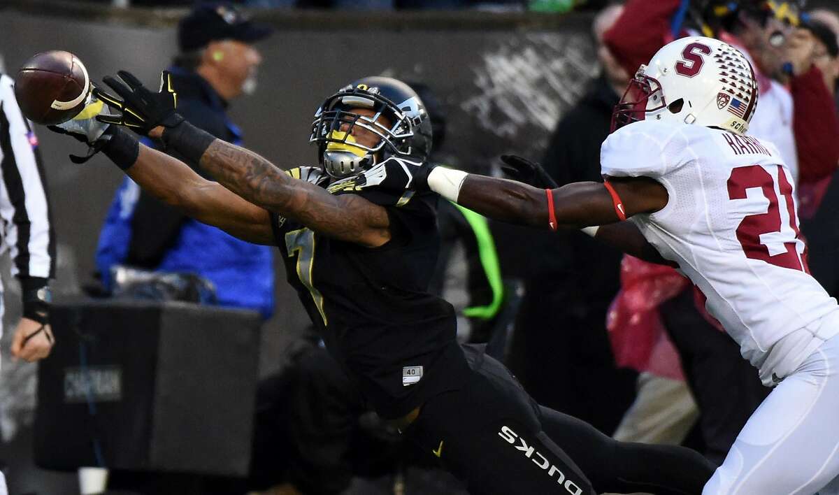 EUGENE, OR - NOVEMBER 1: Wide receiver Keanon Lowe #7 of the Oregon Ducks can't quite reach a pass reception during the first half of the game against the Stanford Cardinal at Autzen Stadium on November 1, 2014 in Eugene, Oregon. (Photo by Steve Dykes/Getty Images)