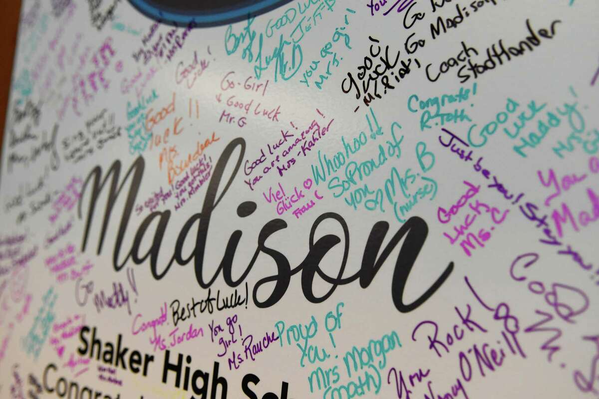 A sign board signed by supporters of Madison VanDenburg, the 17-year-old singer sensation from Latham, N.Y., is seen at Shaker High School during the school's American Idol viewing party for the season finale in which VanDenburg performs on Sunday, May 19, 2019 in Latham. (Jenn March, Special to the Times Union)