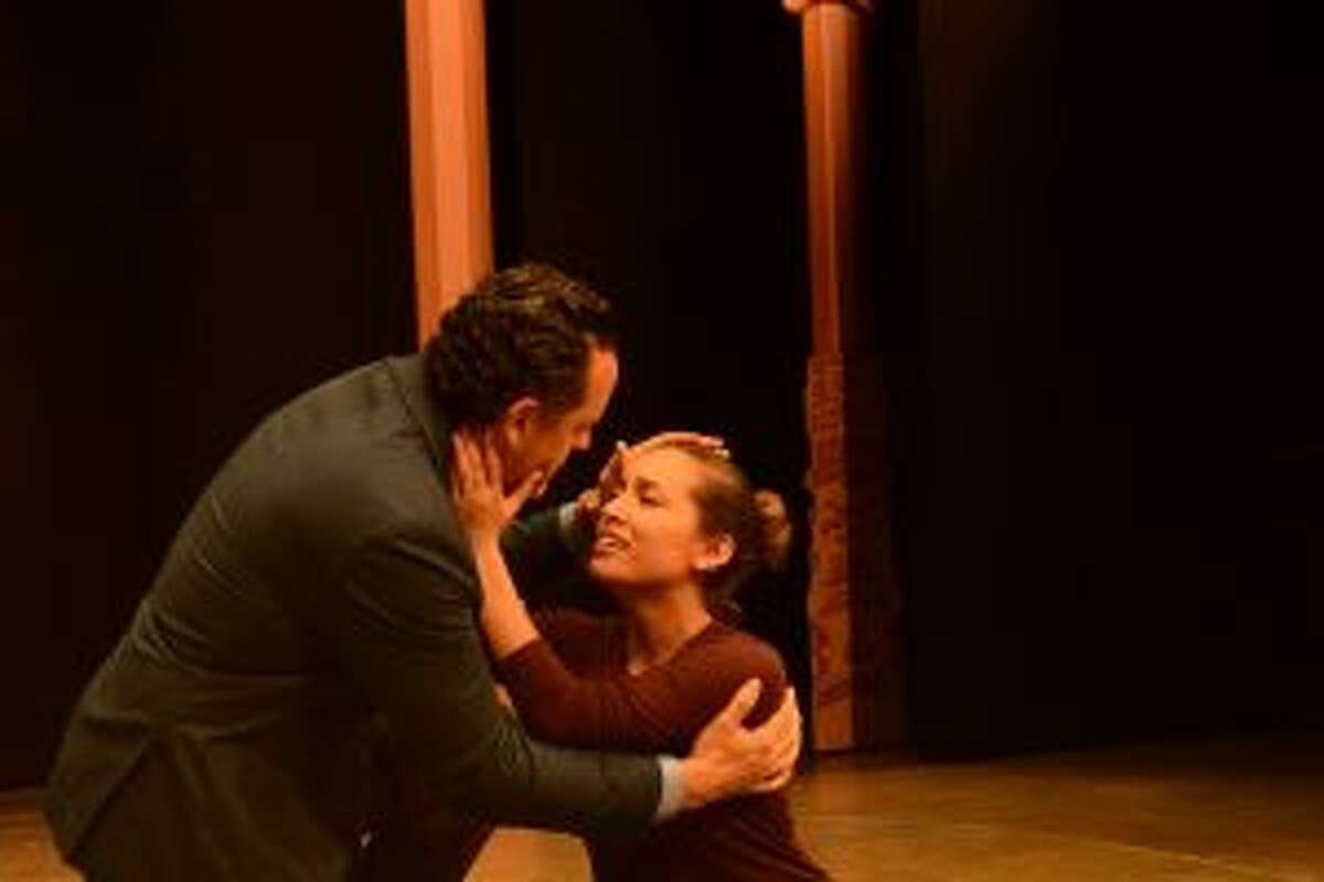Eva (Julia Estrada) sings "You Must Love Me" to Juan Peron (Ryan K. Bailer), indicating she at last realizes he loves her for herself rather than what she has done to advance his career. — Andrea Valluzzo photo