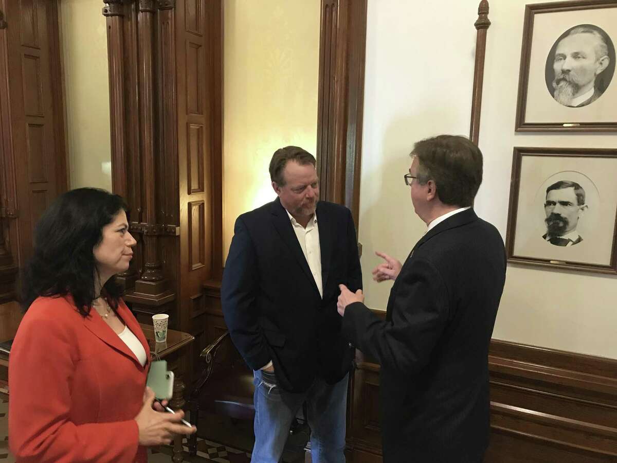 Country music star Pat Green is pushing for a bill in the Texas Legislature that would create a music incubator fund to help struggling venues in Texas continue producing a pipeline of Texas music. Green, center, is seen here speaking to Texas Lt. Gov. Dan Patrick a Republican. State Sen. Carol Alvarado is sponsoring the bill in the Texas Senate.