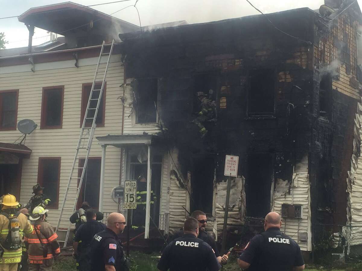 Fire rages in Rensselaer row houses