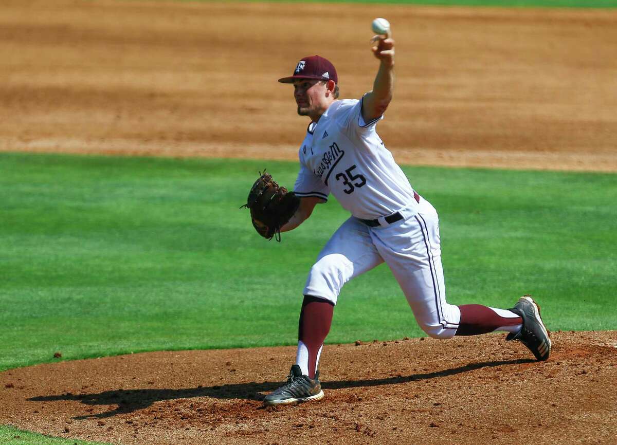 Texas A&M pitcher Asa Lacy throws a pitch during the third inning of the Southeastern Conference tournament NCAA college baseball game against Florida, Tuesday, May 21, 2019, in Birmingham, Ala. (AP Photo/Butch Dill)