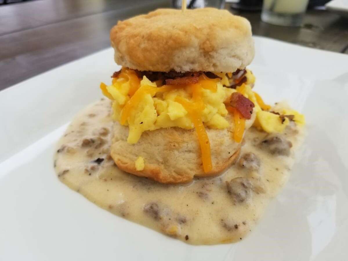 A bacon, egg and cheese biscuit with white sausage gravy at Alamo Biscuit Co.