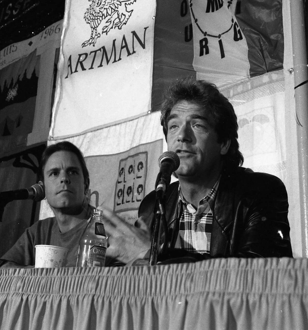 Bill Graham and San Francisco musicians would announce plans to organize a series of concert to benefit AIDS, March 22, 1989 Seen here are member of the Grateful Dead Bob Weir (l) and Huey Lewis (r)