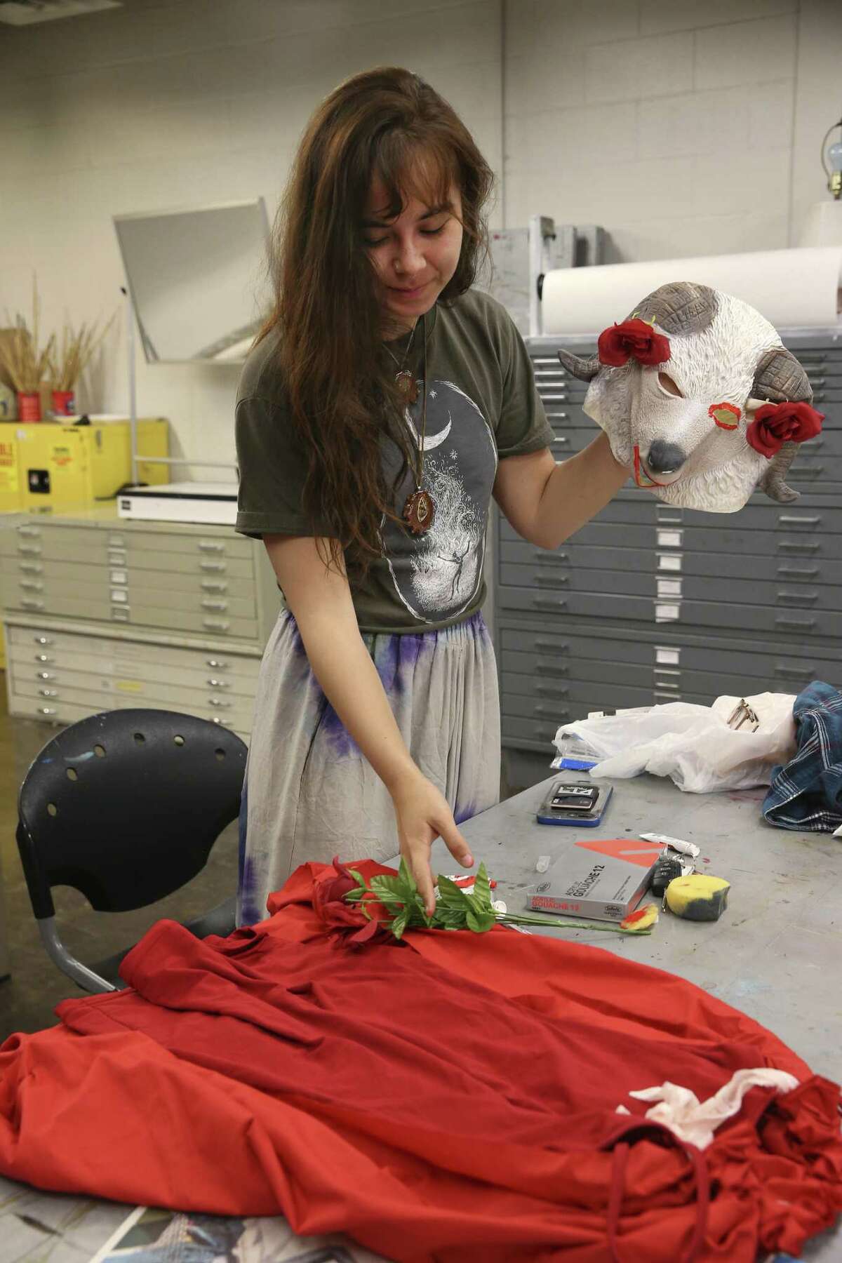 Karina Liu works on her costume at the Southwest School of Art.