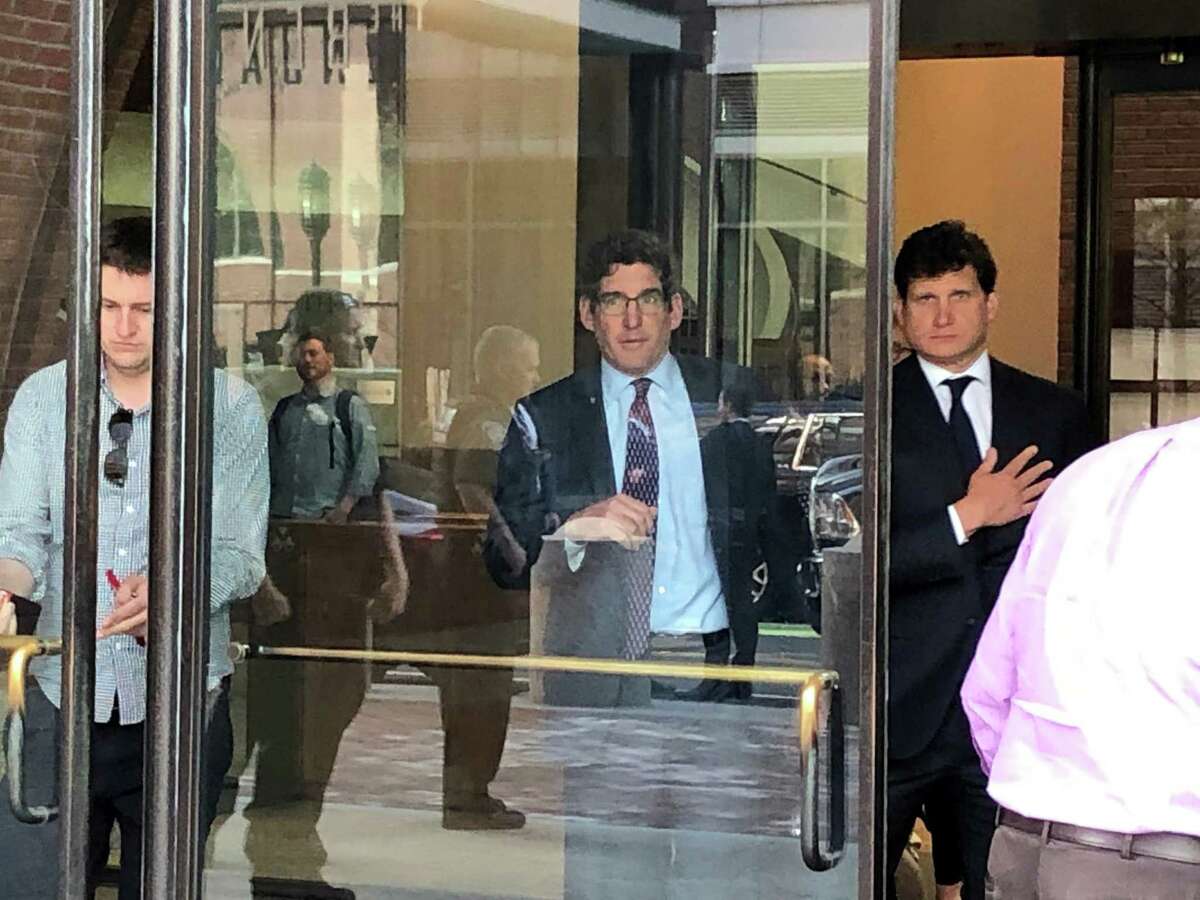 Greenwich lawyer Gordon Caplan leaves the federal courthouse in Boston after entering his guilty plea May 21 in the college admissions cheating scandal.