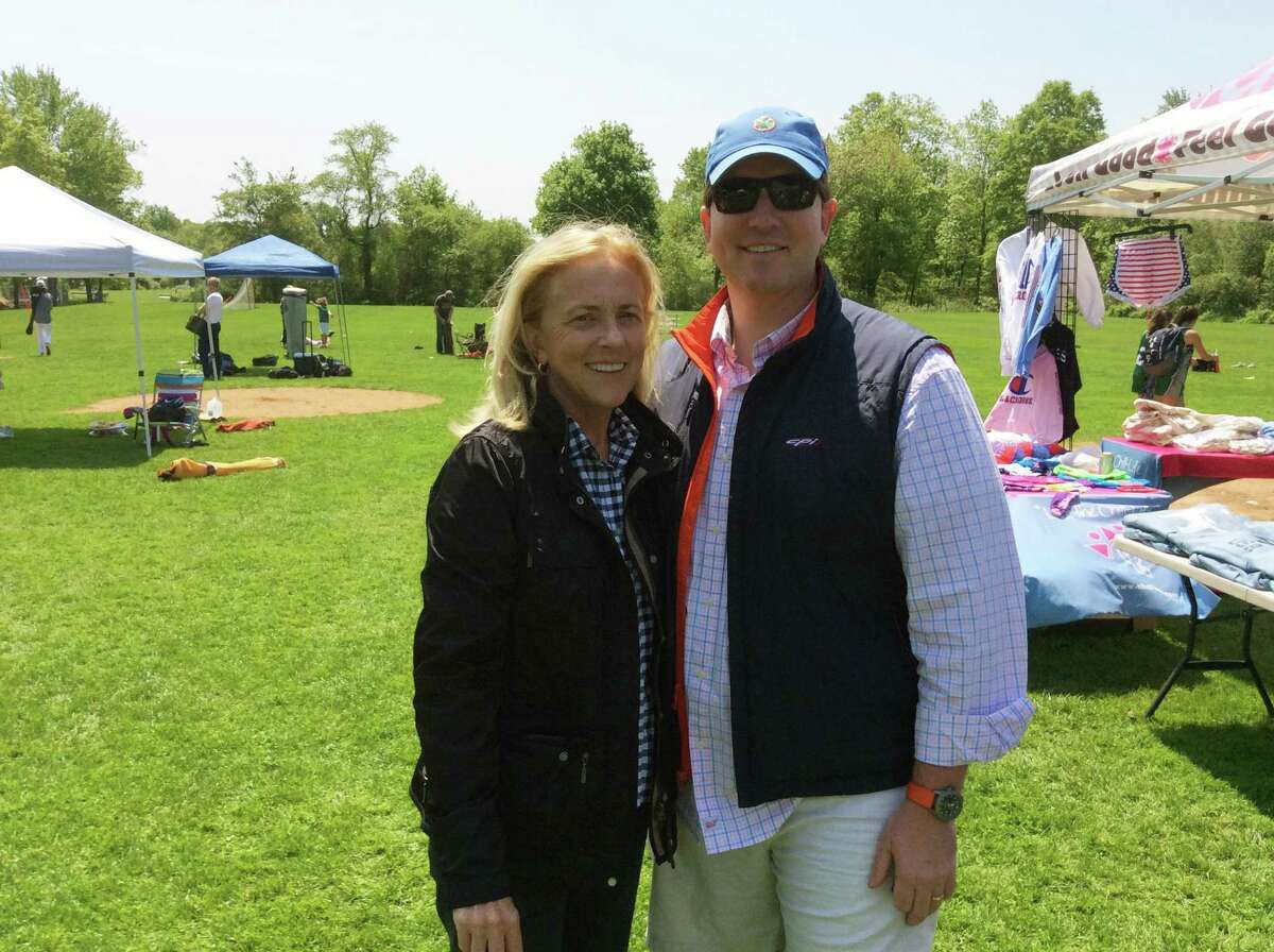 Tricia Higgins O’Callaghan, left and her son Tim Higgins, gather at the Katie Cassidy Higgins Memorial Lacrosse Tournament held at Sacred Heart Greenwich on Sunday, May 19, 2019. The event benefited Higgins O’Callaghan’s beloved late daughter Katie Cassidy Higgins.