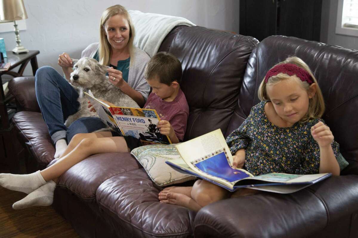 Brittany Parsons home schools her children, Micah, 6, and Caylee, 7, on Wednesday, May 8, 2019, in Weatherford, Texas. Brittany is stuck with a $36K unpaid bill that her insurer did not pay even though she had a life threatening emergency and under Texas law insurance companies must pay network rates regardless if they are in or out of network. She first went to a free-standing ER and was transferred to a traditional hospital where she spent a week, three days in ICU. BCBS paid her hospital charges but not the freestanding ER. The insurance industry vowed to crack down on frivolous and overpriced emergency rooms claims by denying payment outright if a patient did not need emergency care. But what happens when the patient is, in fact, having an emergency? Blue cross Blue Shield of Texas said it would pay in such cases but that is not always happening, again leaving patients trapped with tens of thousands of unpaid claims that they must now pay.
