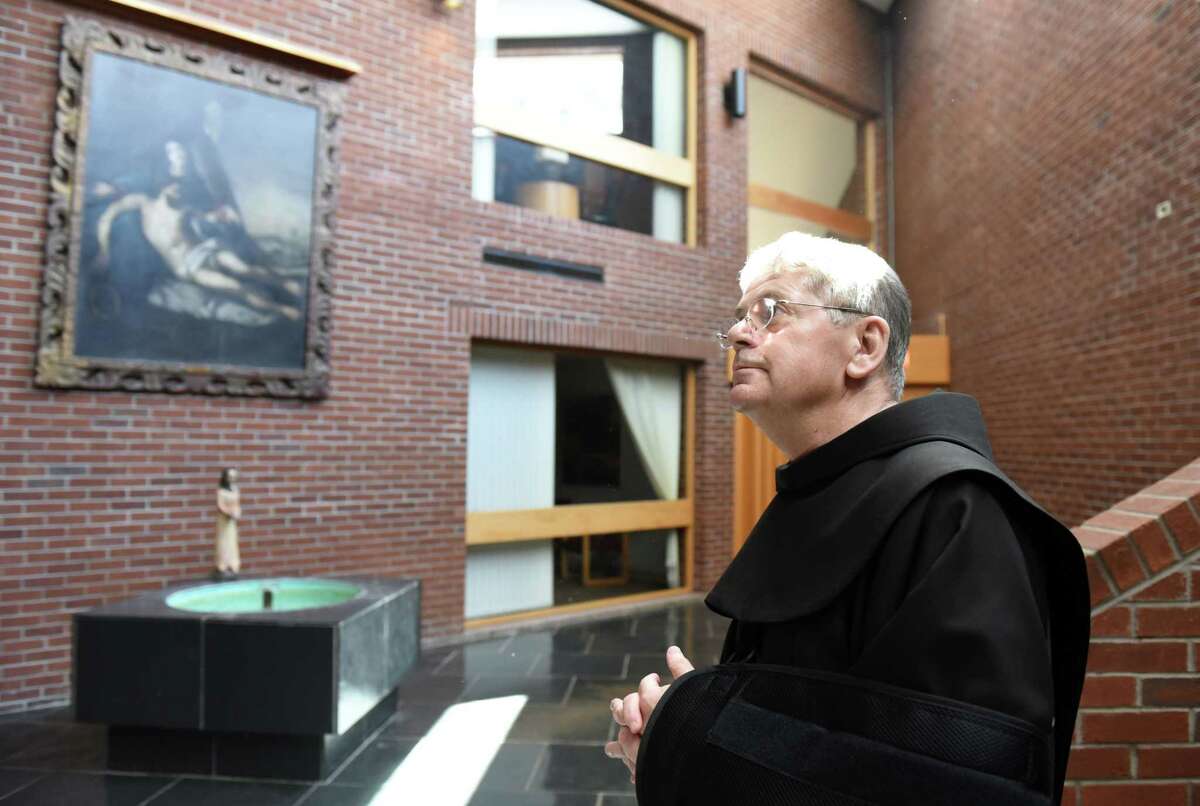 Brother Ed Coughlin stands in the inner lobby at the Siena friary on Wednesday, April 3, 2019 in Loudonville, NY. (Phoebe Sheehan/Times Union)
