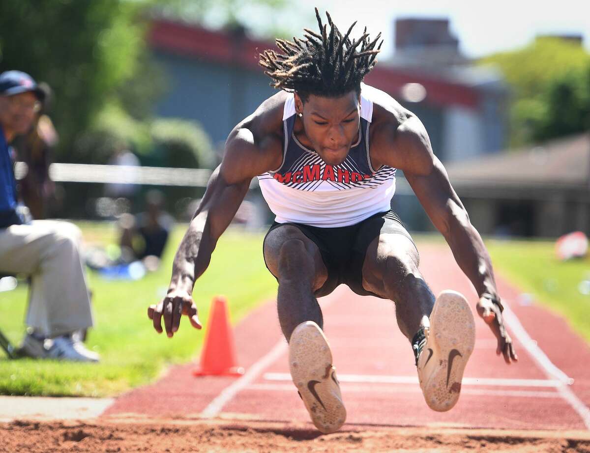 McMahons Justin Forde wins the long jump with a distance of 24 feet, 61/4 inches at the FCIAC Outdoor Track and Field Championships at Southern Connecticut State University in New Haven on Tuesday.