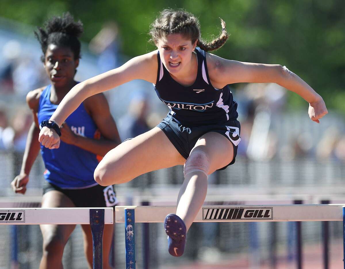 Ridgefield boys, Danbury girls win FCIAC track titles
