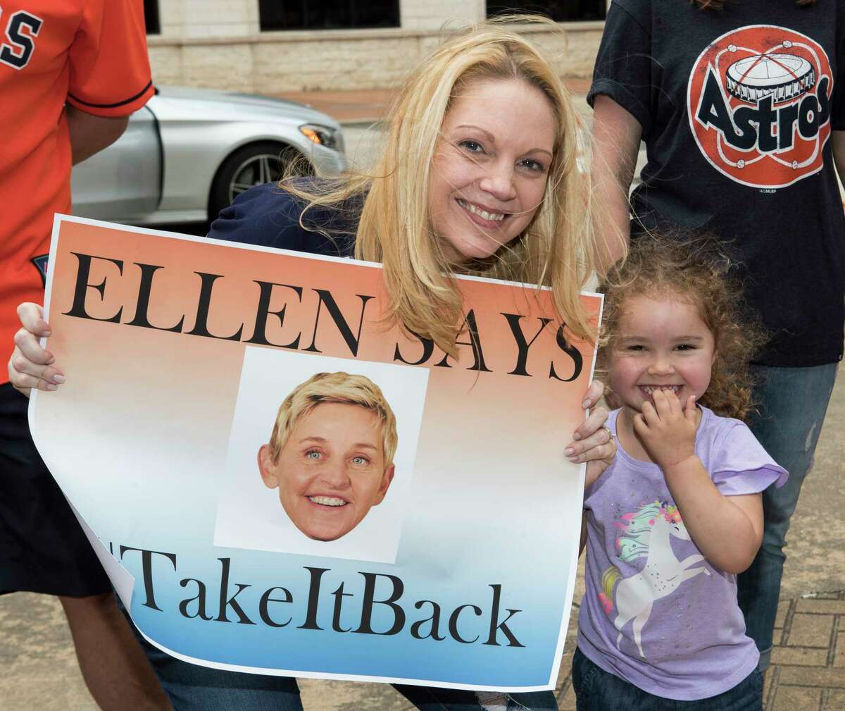 Houston Astros fans line up for a chance to appear on "The Ellen DeGeneres Show” in a segment being taped outside Minute Maid Park on Wednesday, May 22, 2019, in Houston.