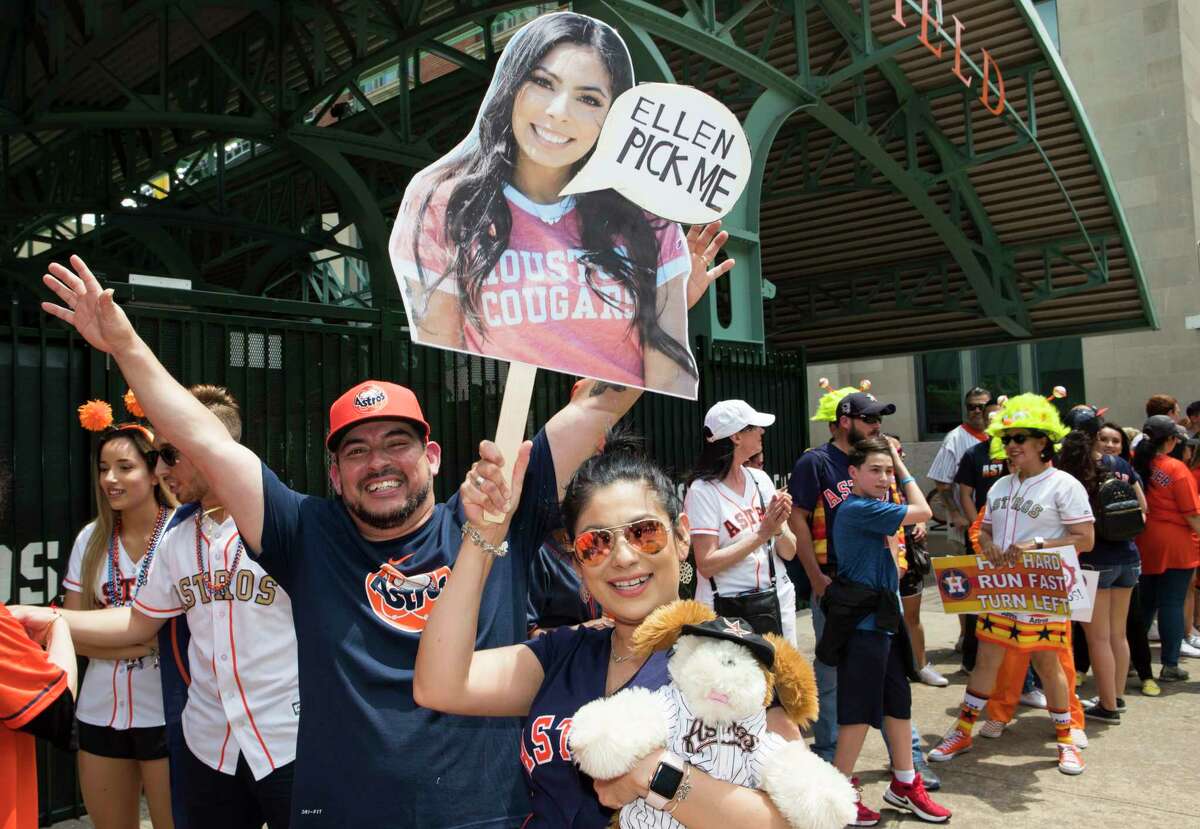 Houston Astros fans line up for a chance to appear on "The Ellen DeGeneres Show” in a segment being taped outside Minute Maid Park on Wednesday, May 22, 2019, in Houston.