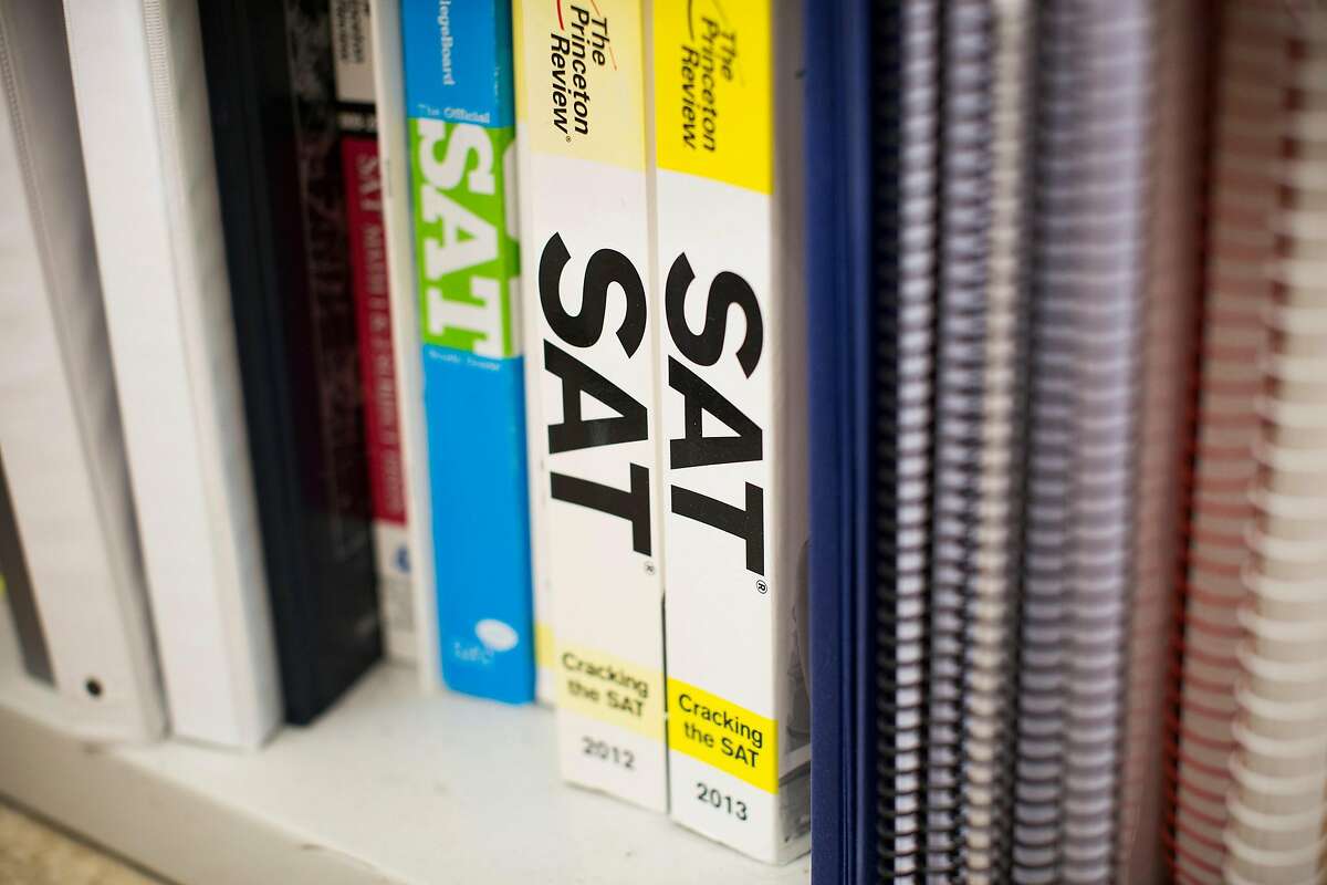 FILE -- SAT prep books at Match Charter School in Boston, Jan. 22, 2016. The SAT is adding an “adversity score” to the test results that is intended to help admissions officers account for factors like educational or socioeconomic disadvantage that may depress students’ scores, the College Board said on May 16, 2019. (Shiho Fukada/The New York Times)