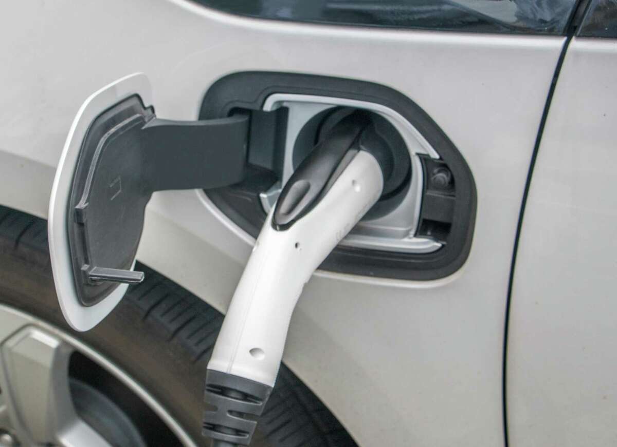 Texas is considering whether to impose additional registration fees on electric and hybrid vehiclesto compensate for lost gasoline taxes used to maintain roads and highways.