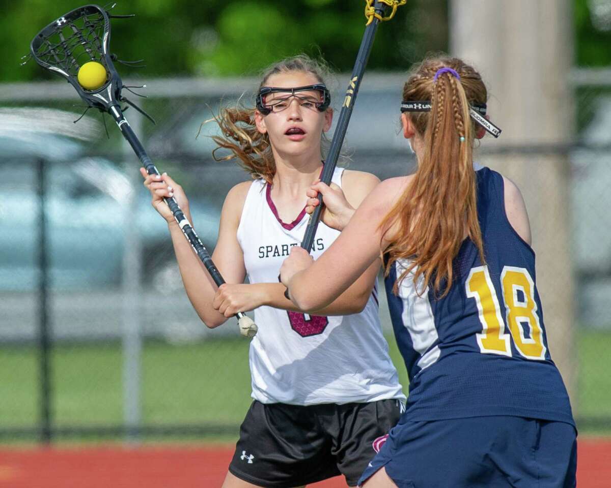 Burnt Hills-Ballston Lake midfielder MK Lescault looks past Averill Park defender Janey Adams during the Section II, Class C championship at Mohonasen High School on Wednesday, May 22, 2019 (Jim Franco/Special to the Times Union.)