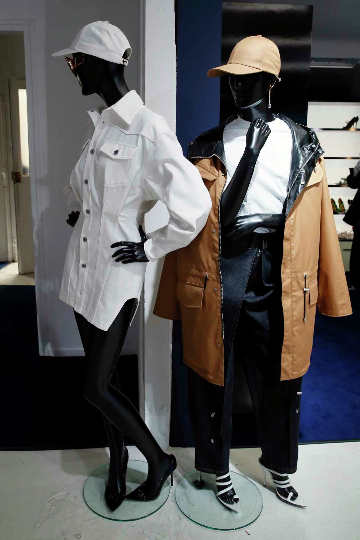Designs are displayed as Rihanna unveils her first fashion designs for Fenty at a pop-up store in Paris, France, Wednesday, May 22, 2019. Singer Rihanna is the first black woman in history to head up a major Parisian luxury house, and the collection, named after the singer turned designer's last name, comprises of ready-to-wear, footwear, accessories, and eyewear and is available for sale Paris' Le Marais area from Friday and will debut online May 29.