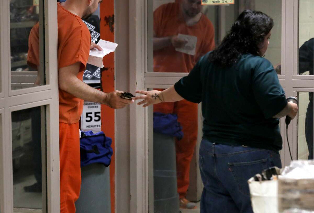 An inmate at the Bexar County Detention Center buys items at the commissary, on Thursday, May 9, 2019.