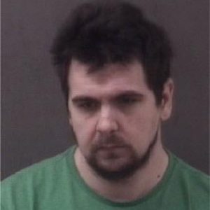 Man charged with biting police officer