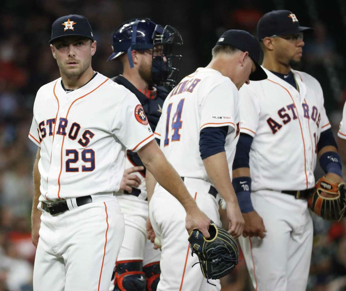 Astros starting pitcher Corbin Martin, left, exits after allowing four runs against the White Sox.