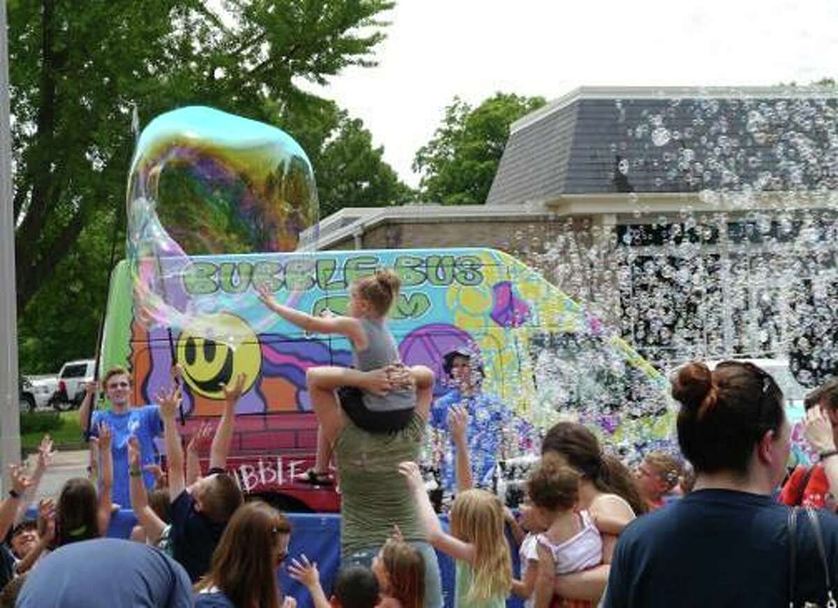 A bubble buss is part of the Summer Reading Kickoff Party at the Edwardsville Library on Wednesday.
