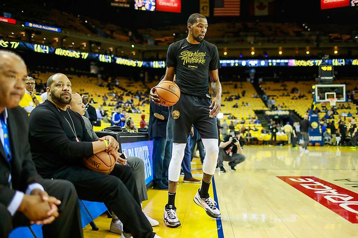 Kevin Durant warms up ahead of Game 5 of the Western Conference Semifinals between the Golden State Warriors and the Houston Rockets at Oracle Arena in Oakland, California, on Wednesday, May 8, 2019. The series is tied 2-2.