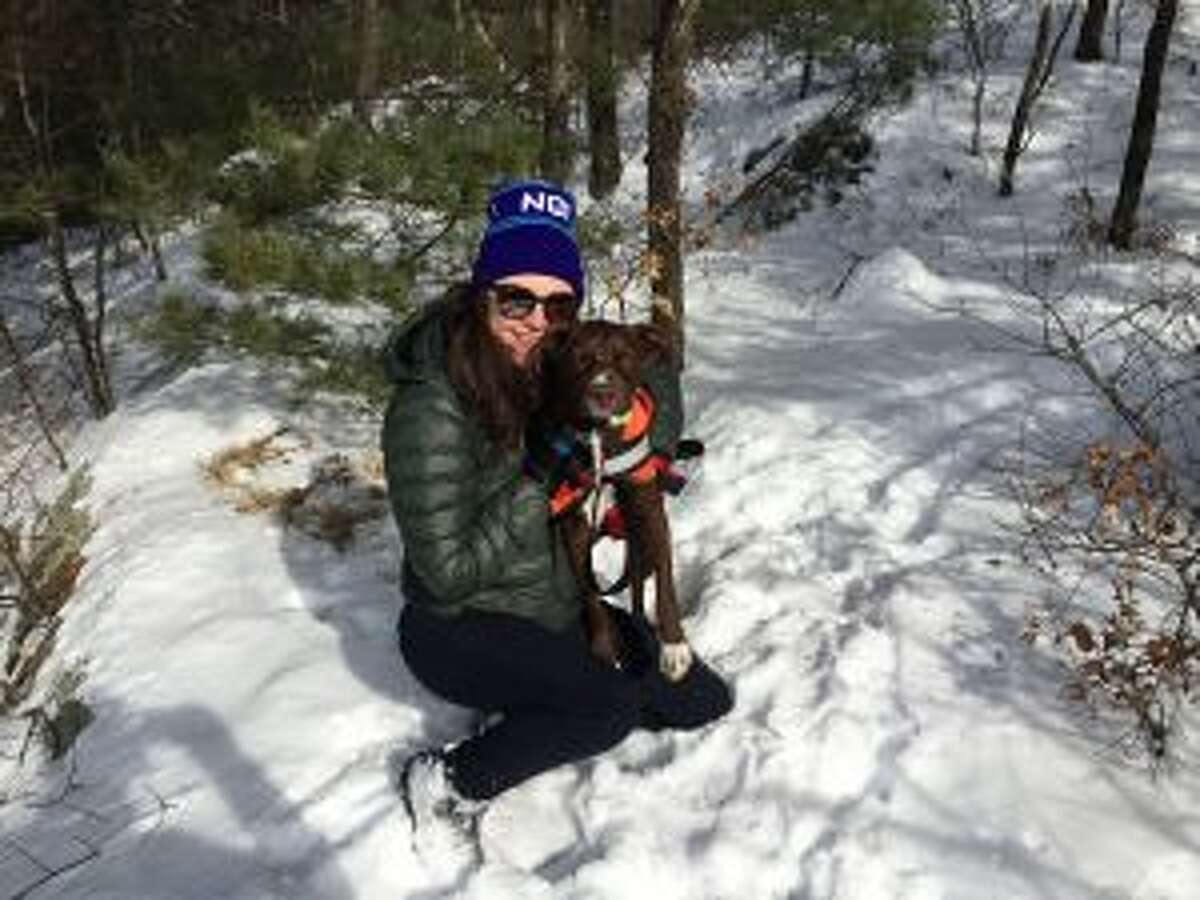 Rob's daughter Katie with her dog, Munro.